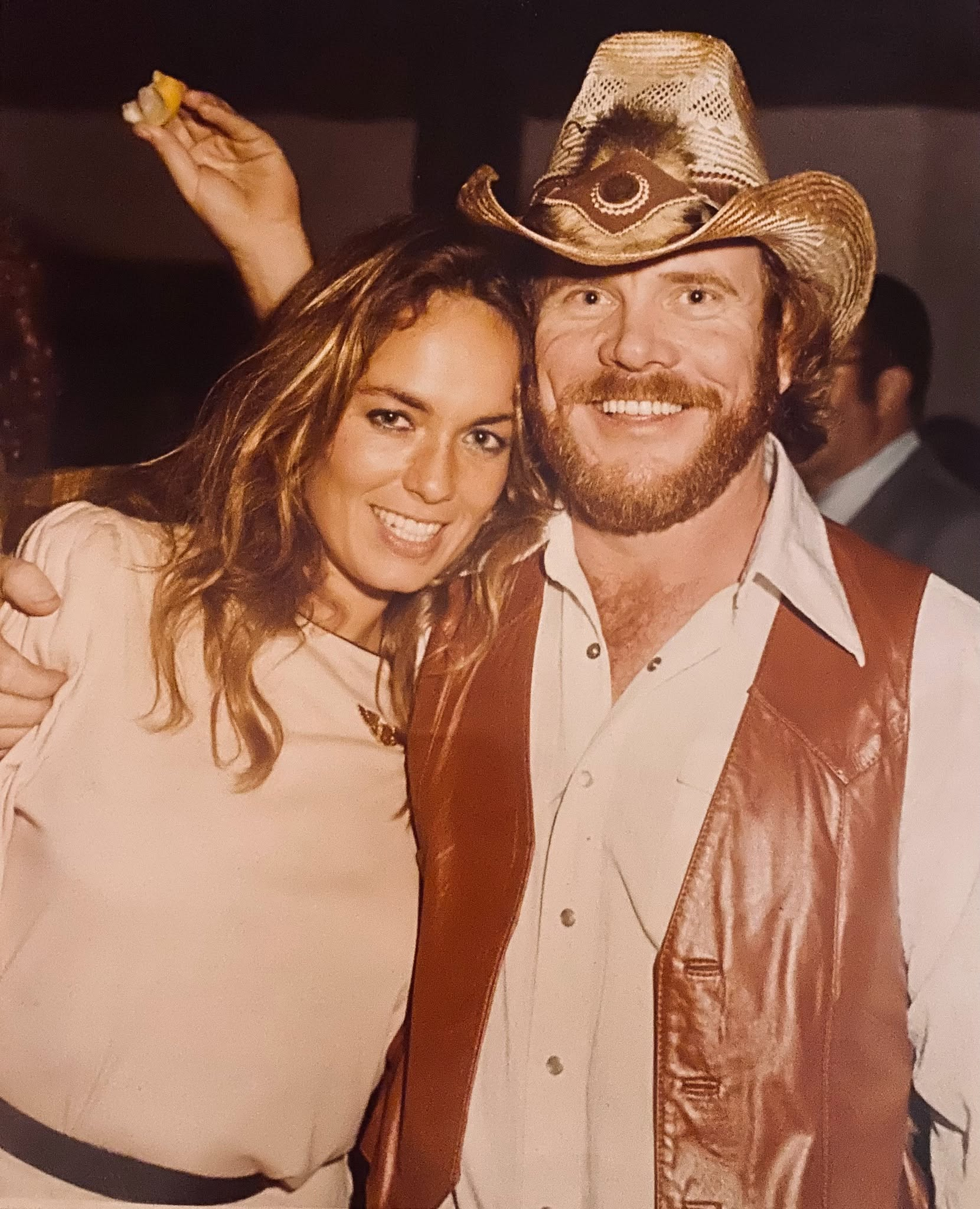 Josh Logan with Daisy Duke from The Dukes of Hazzard at an indoor gathering