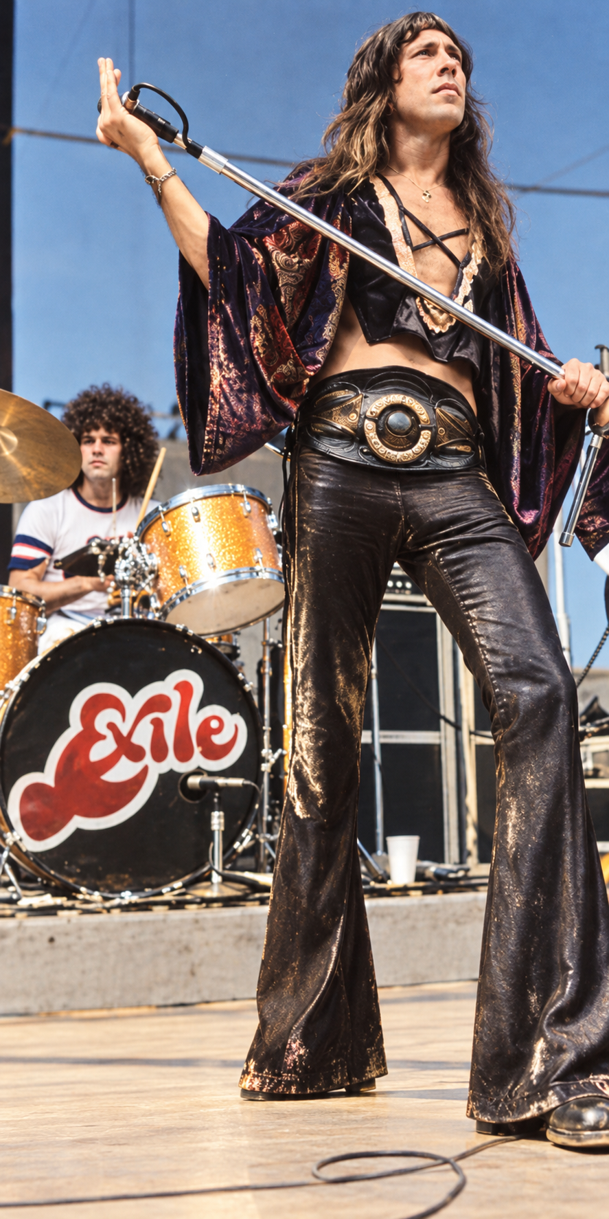 Color archival photograph of The Exiles performing onstage, with the drummer behind the vocalist